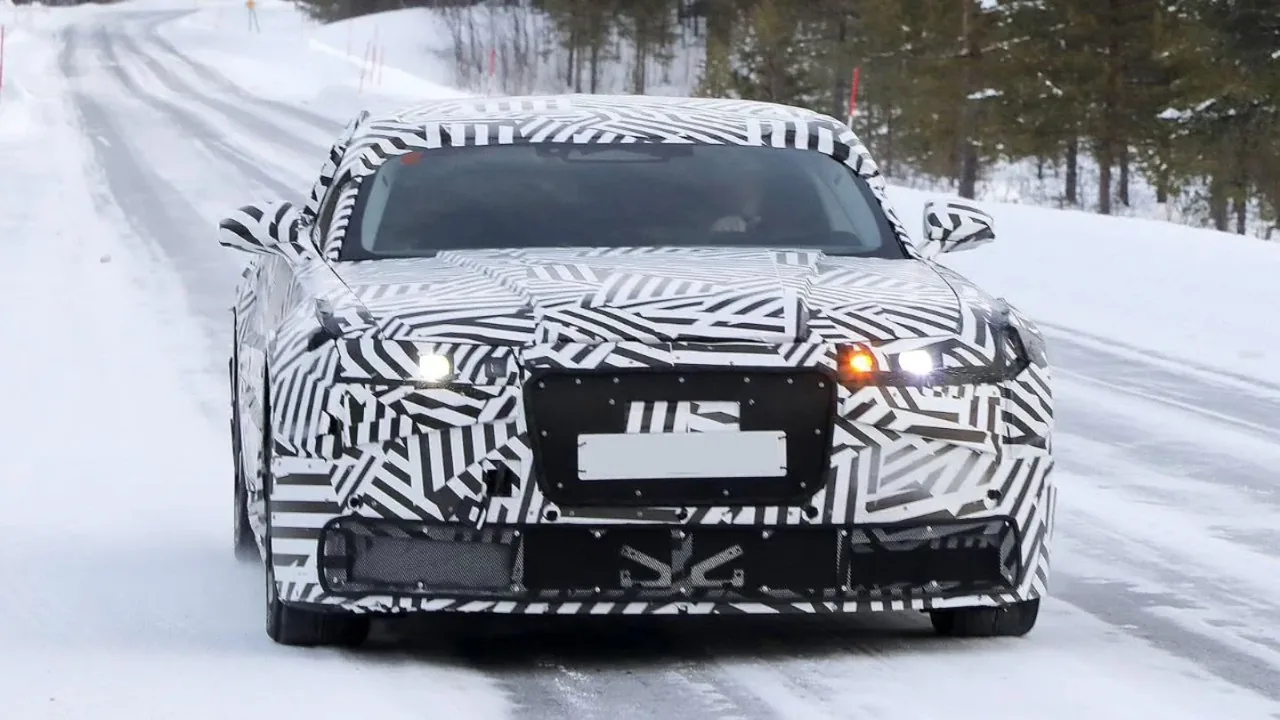 New Jaguar GT spotted undergoing winter testing in snowy conditions