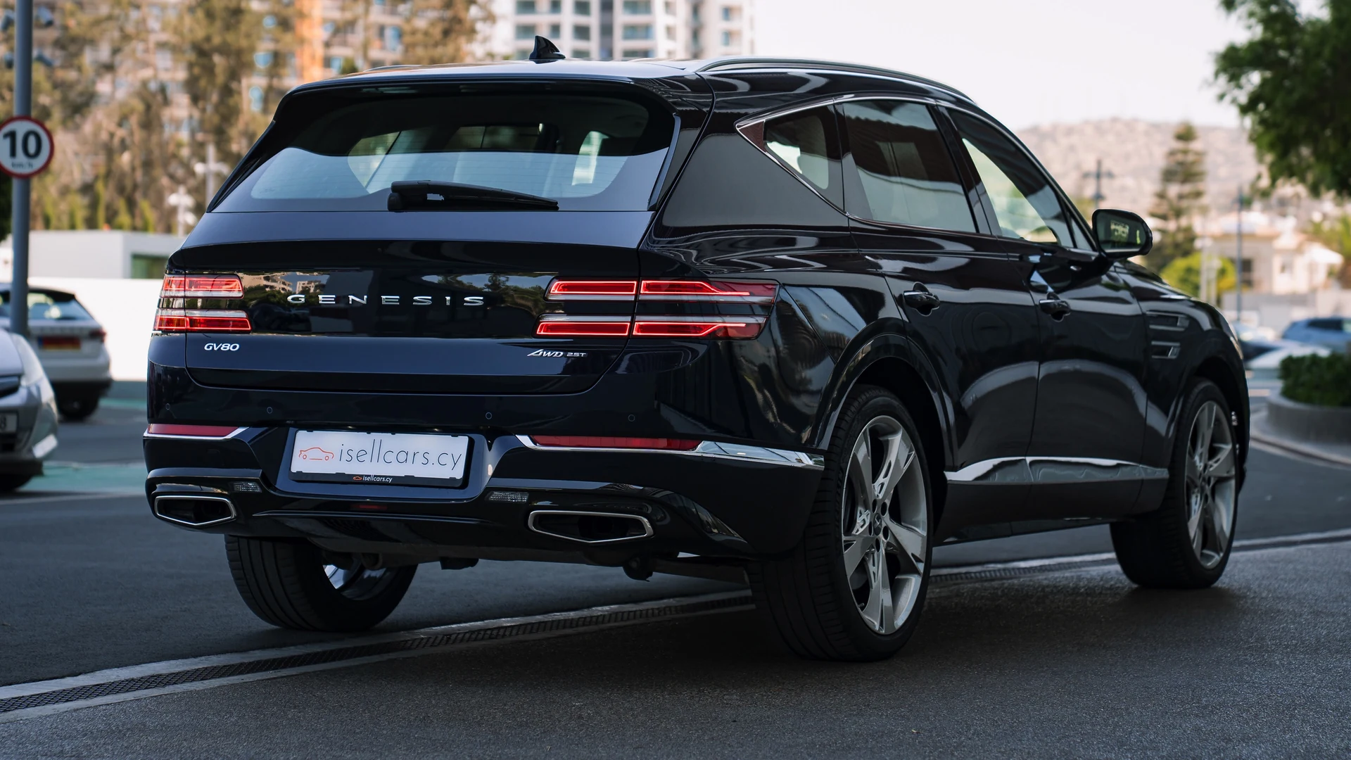 Rear three-quarter opposite side, coupe-like roofline. Car 80